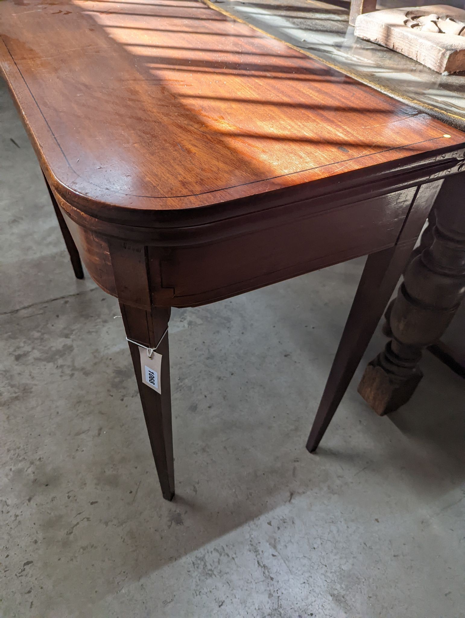 A George III rectangular mahogany folding card table, width 94cm, depth 47cm, height 74cm